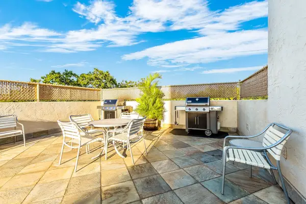 Sunny Courtyard With Grilling Area