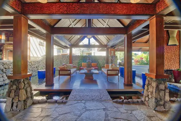 Pavilion offers comfortable seating, natural light, and tropical garden views