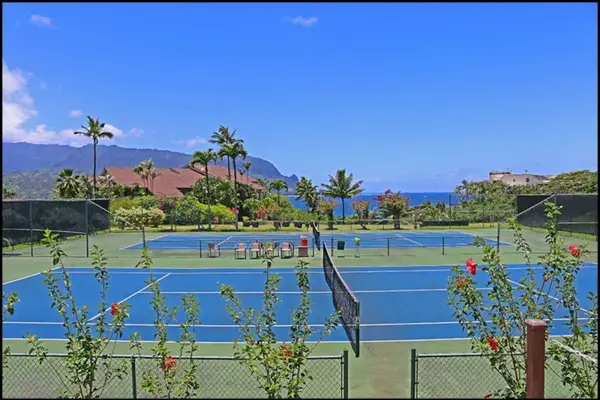 Outdoor tennis courts provide active recreation with mountain views nearby