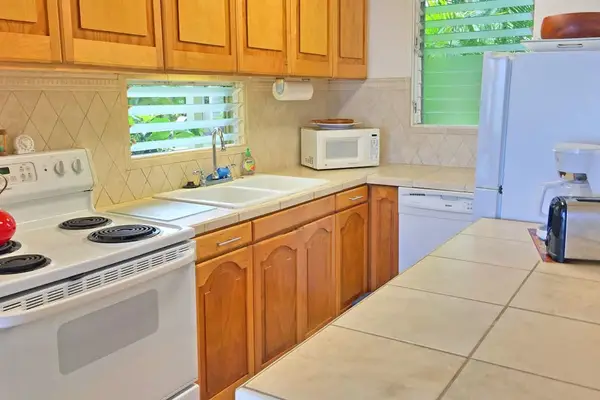 Bright kitchen offering plenty of space to prepare your favorite meals.