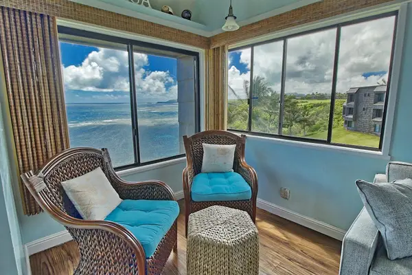 Extra seating in living room with panoramic views.