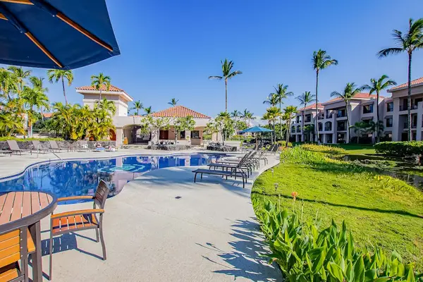 Expansive Community Pool Deck Overlooking Resident Buildings & Tropical Grounds