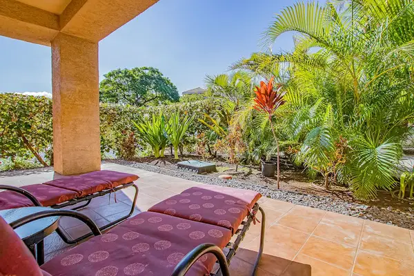 Private Covered Patio with Sun Loungers & Lush Garden Views