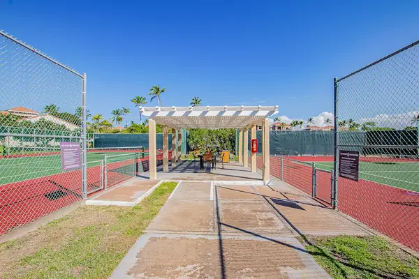 On-Site Tennis Courts Featuring Covered Player Pavilion & Seating