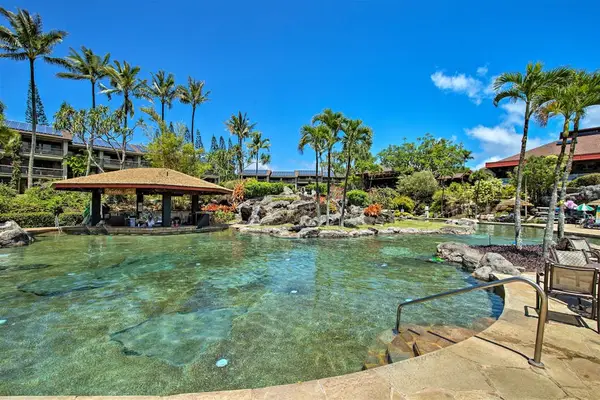 Relax poolside while enjoying peaceful tropical scenery and warm sunshine