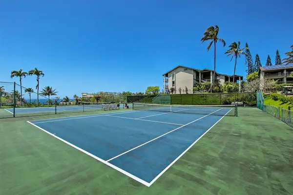 Stay active on spacious tennis courts beneath beautiful tropical skies