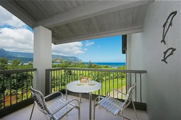 Enjoy morning coffee on the balcony with peaceful tropical views
