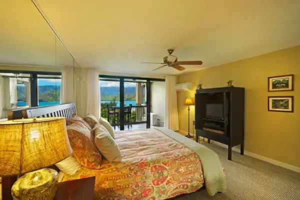 Rest comfortably in this peaceful bedroom after sunny island adventures