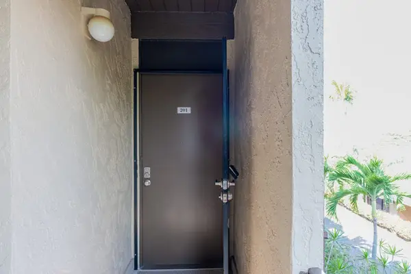 Glass Sliding Door Access, Exterior Lighting & Scenic Palm Views