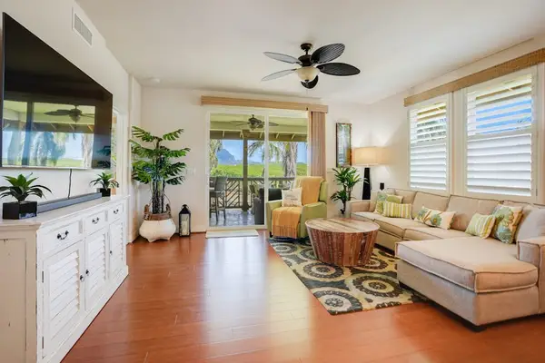 Bright Living Room Filled With Island Charm