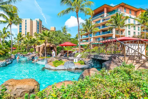 Resort Pool Surrounded By Lush Paradise