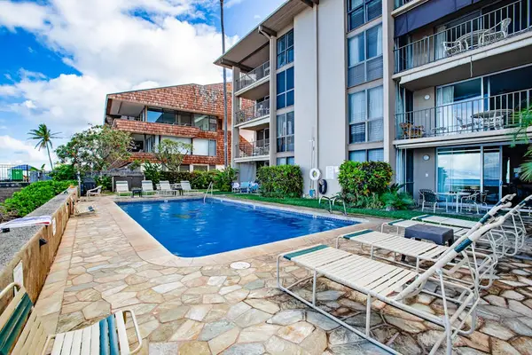 Lounge poolside with stunning ocean views and plenty of space to unwind.