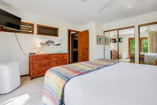 Bright Bedroom Suite View Highlighting Ensuite Bathroom Entrance
