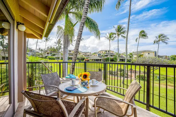 Scenic Covered Patio Dining Area Overlooking Tropical Palm Trees & Gardens