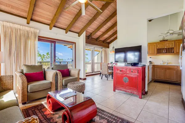 Open Living Space with Entertainment Console & Direct Lanai Access
