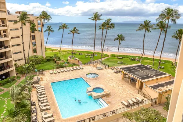 Resort Pool With Endless Ocean Backdrop