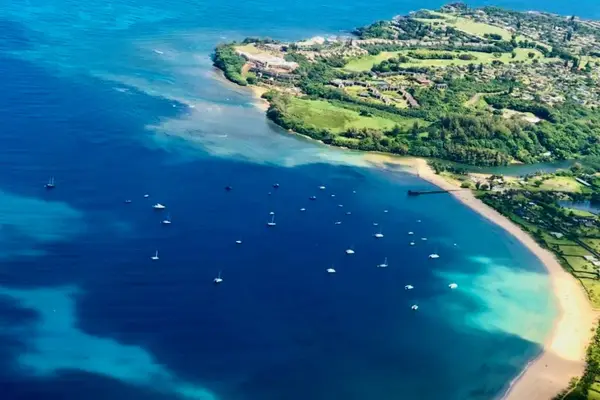 Stunning aerial view showcases turquoise waters and beautiful tropical coastline