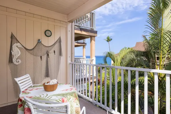 Private balcony with ocean glimpses, your perfect spot for morning coffee or sunset drinks.