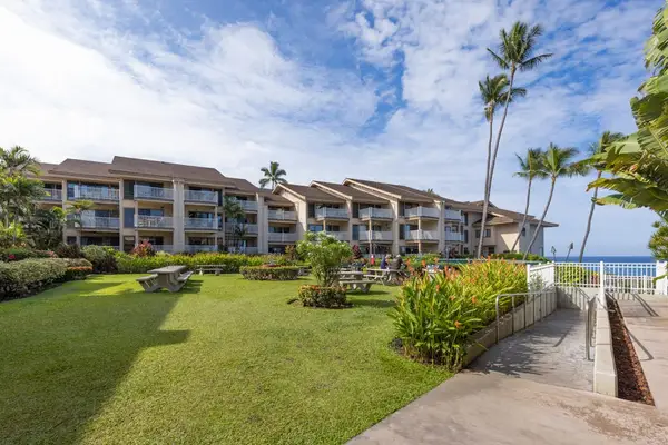 Resort Building Exterior with Ocean Backdrop