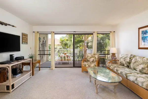 Bright Living Room with TV & Private Balcony Access