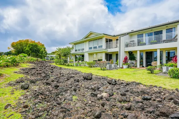Well-maintained resort grounds with scenic mountain backdrops and tropical landscaping