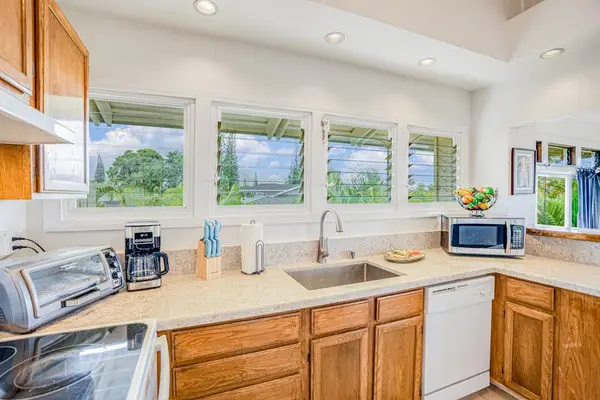 Sunlit Kitchen With Island Charm