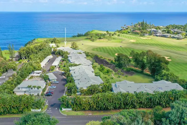 Stunning aerial view of the lush Princeville coastline and ocean backdrop