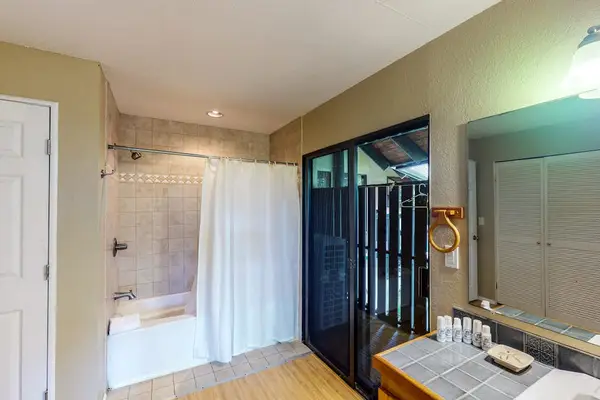 Private ensuite bath with spa-like comfort, just steps from the king suite