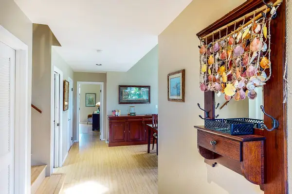 Welcoming entryway with tropical coastal charm