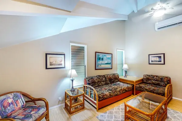 A peaceful reading retreat with comfortable rattan seating and warm natural light