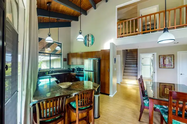 Warm, inviting dining area surrounded by natural light