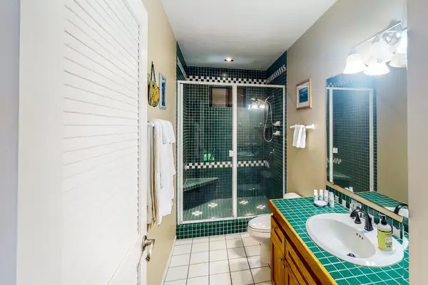 Bright ensuite bathroom offering privacy and comfort