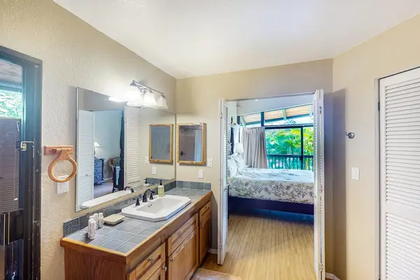 Dual vanity ensuite bathroom offering space and privacy