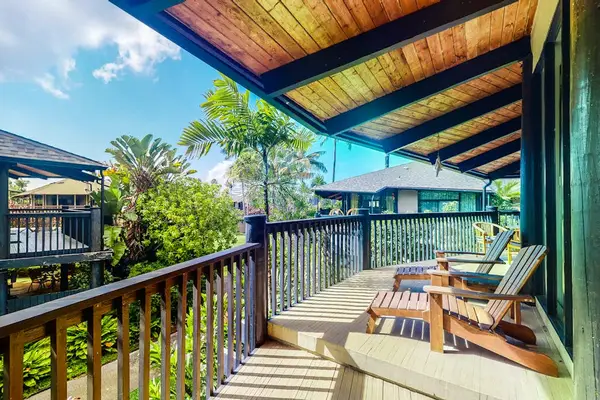 Your private lanai — sip morning coffee surrounded by tropical breeze and greenery