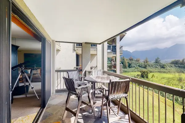 Balcony provides seating with mountain views and refreshing island breezes