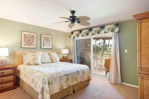 Comfortable bedroom with lanai access