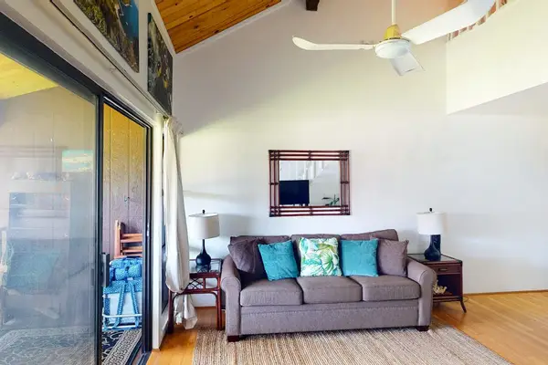 Airy open concept living room provides plenty of space for relaxing with loved ones