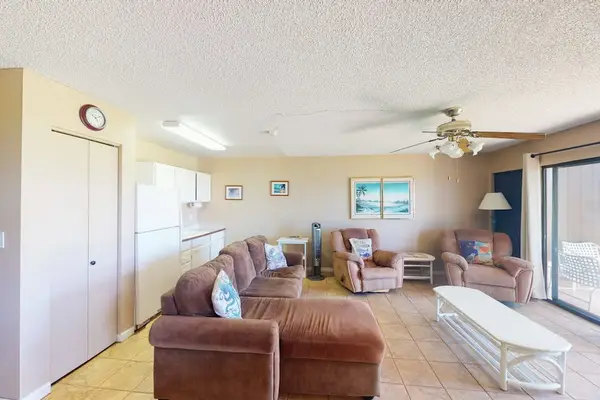 Thoughtfully furnished living room offering plenty of seating for everyone to enjoy