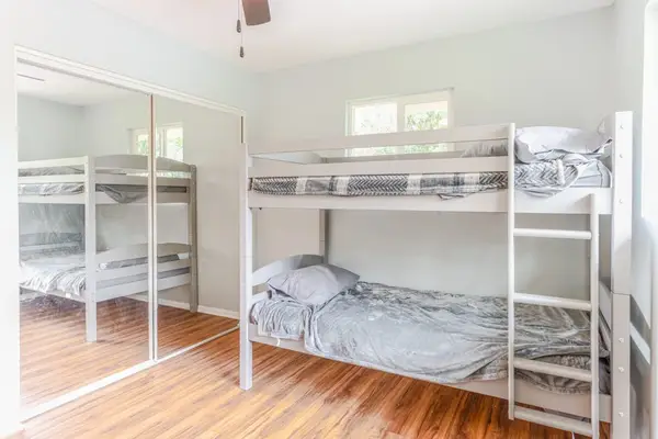 Great kids room with bunk beds with two twin beds allowing for plenty of space in the room.