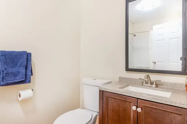 Full bathroom with tub/shower combo.