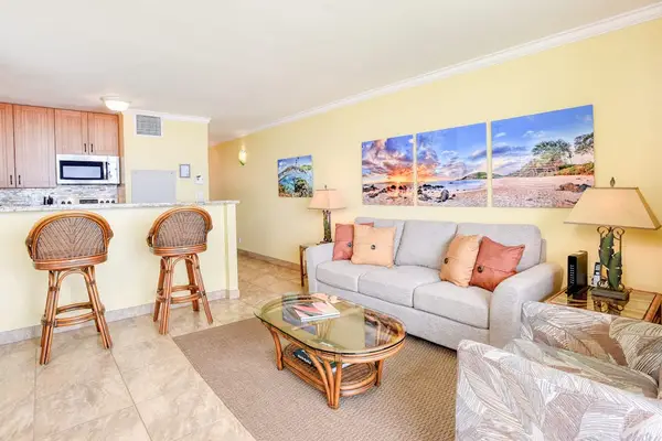 Living room with coastal-themed wall art