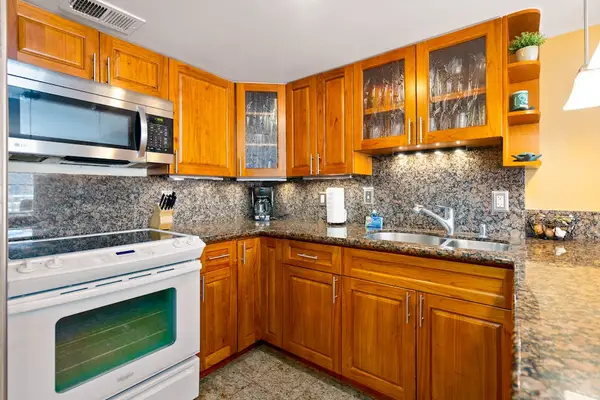 Start every morning with coffee from this bright and functional kitchen area