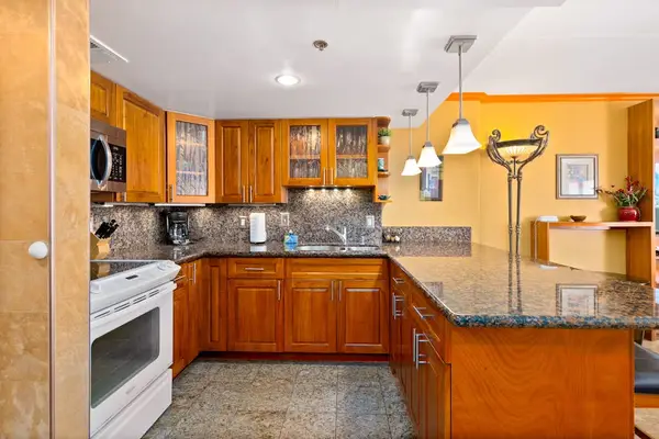 Well equipped kitchen brings convenience to every unforgettable Hawaiian vacation experience together