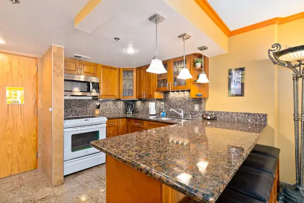 Prepare breakfast lunch and dinner comfortably in this inviting kitchen space daily