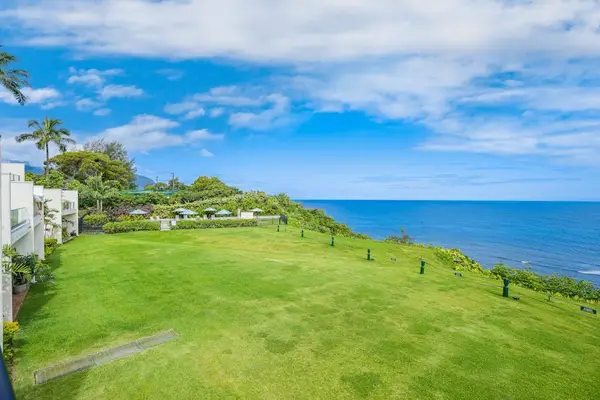 Oceanfront lawn stretching to the sea, ideal for soaking in the view
