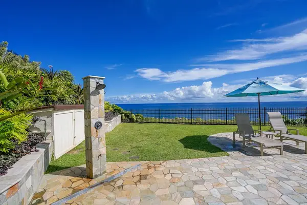 Oceanfront lawn to unwind outdoors with direct views of the sea