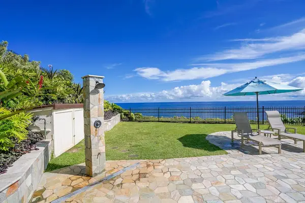 Unwind on the private patio with stunning ocean views