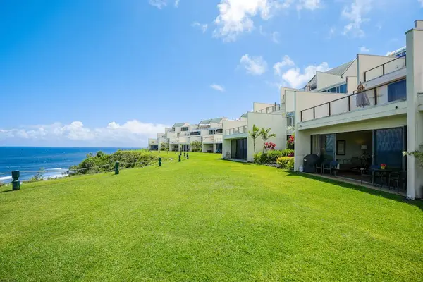 Open oceanfront lawn perfect for relaxing outdoors