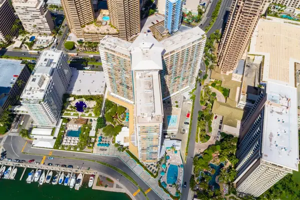 Aerial view showcases the unit within Hawaii's beautiful tropical surroundings from above