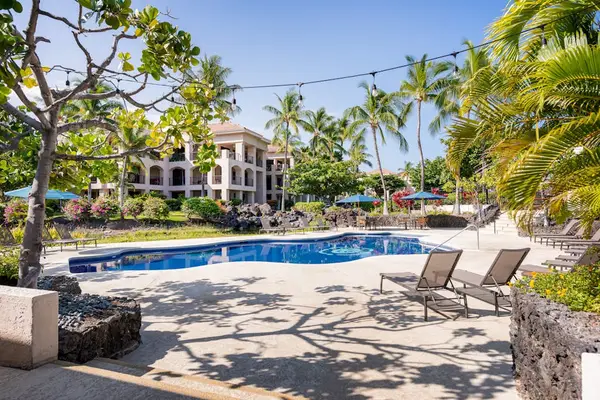 Relax By The Community Pool Under The Island Sun